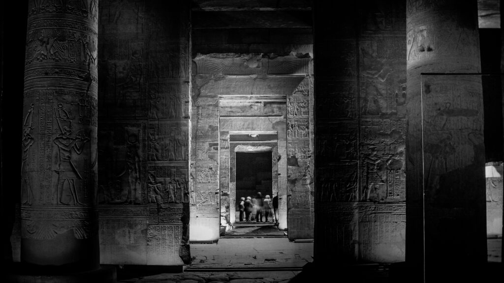 Mysterious ancient Egyptian temple corridor in monochrome – symbolizing hidden truths and forgotten histories